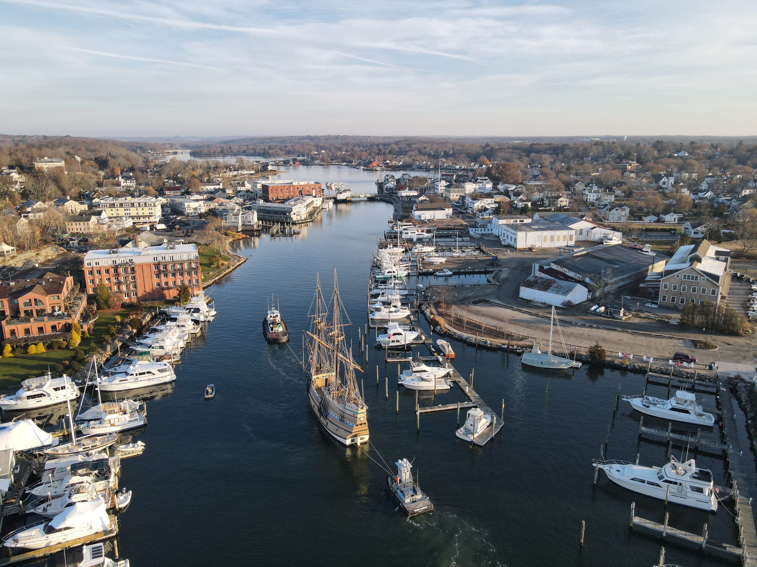 Aerial view of Mystic Seaport and its harbor in autumn
