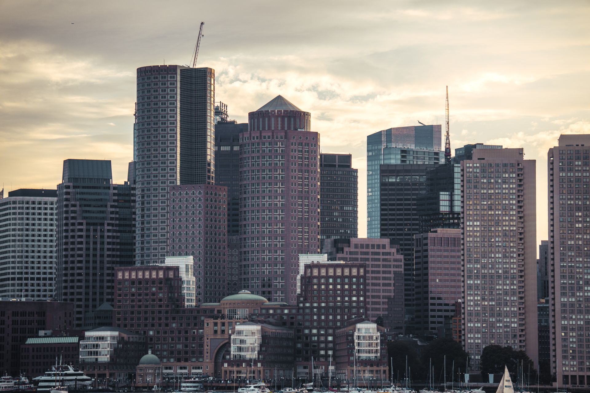 Boston skyline and harbor at blue hour