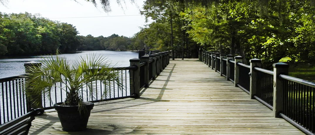 The wooden Conway Riverwalk beside the Waccamaw River