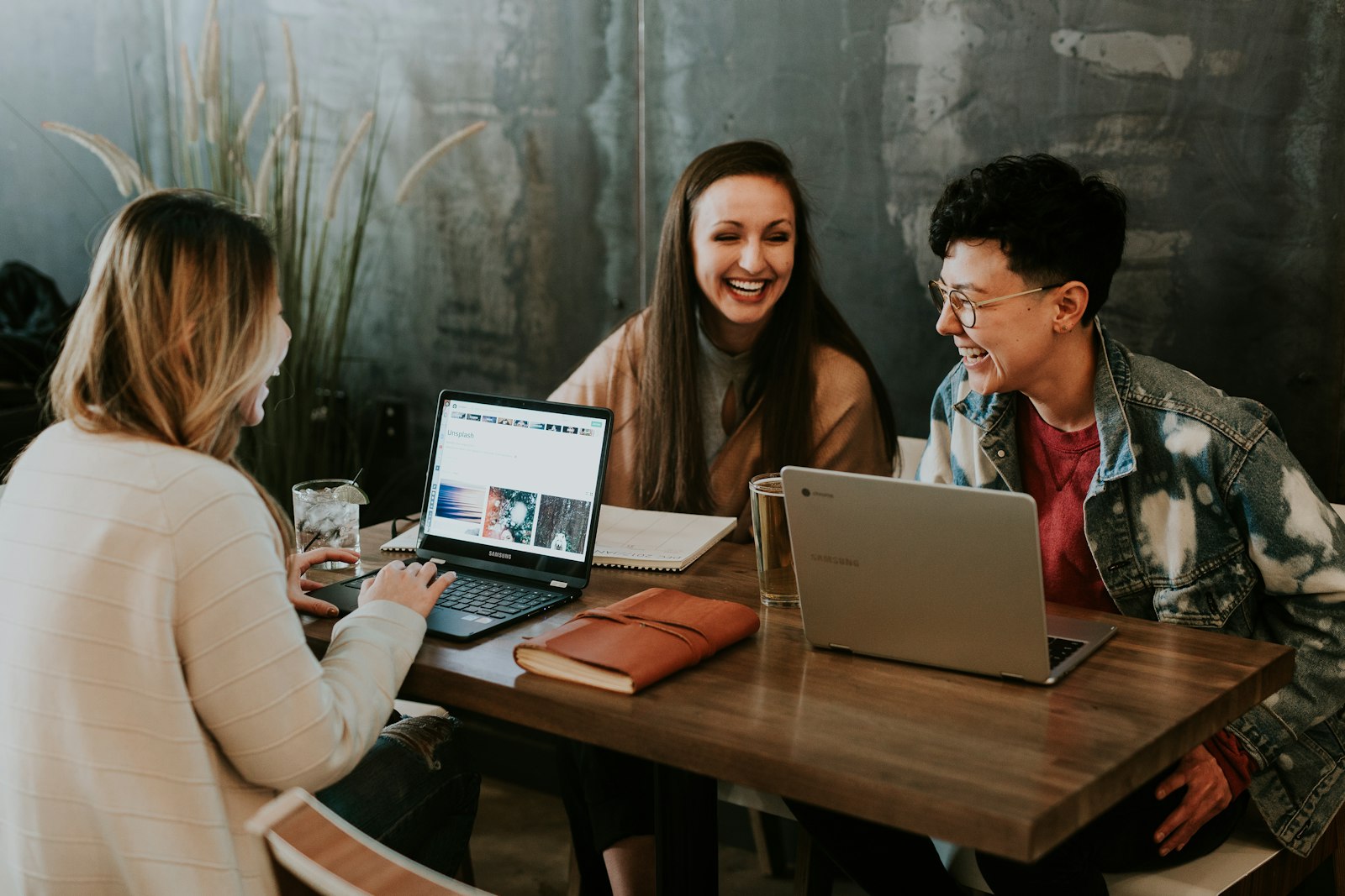 Women laughing together on a girls' weekend getaway